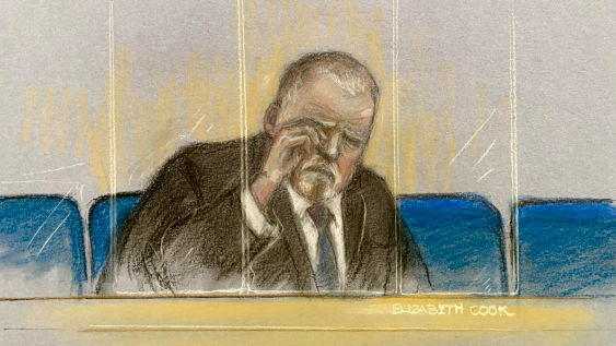 An artist impression showing Robert Bush, a middle-aged man wearing a dark suit and tie, sitting in the dock of a court. He is depicted was his hand covering one eye and a distressed look on his face.