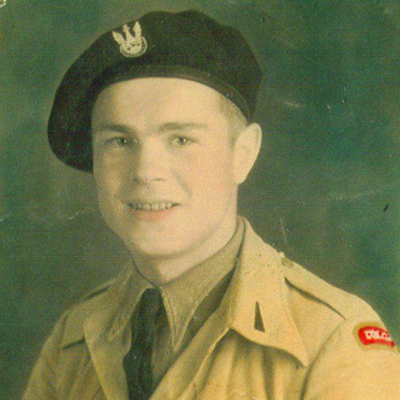 A young Corporal Andrzej Gasior wearing the national union of the Polish army including a beret 