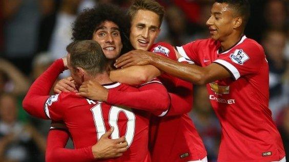 Marouane Fellaini (left) celebrates