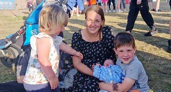 Kate with children at fesatival site