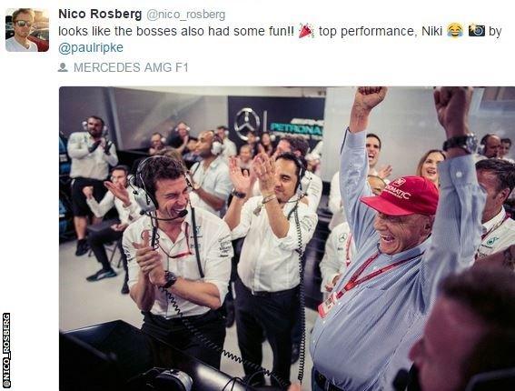 The Mercedes team celebrates after Nico Rosberg's win in Singapore