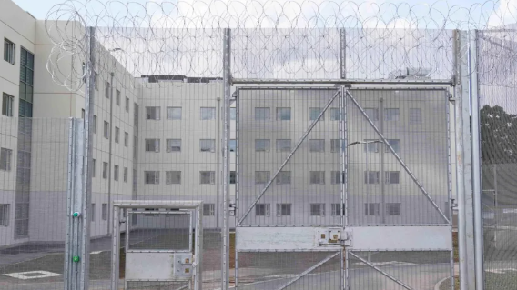 HMP Fosse Way behind a fence 