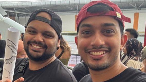 Dwayne Dias (left) and his friend pose for a photo at the concert venue in Singapore, where they had gone to watch Coldplay perform live