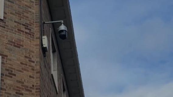 CCTV camera on side of building