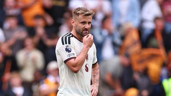 Manchester United full-back Luke Shaw scratches his chin during their Premier League defeat by Hull