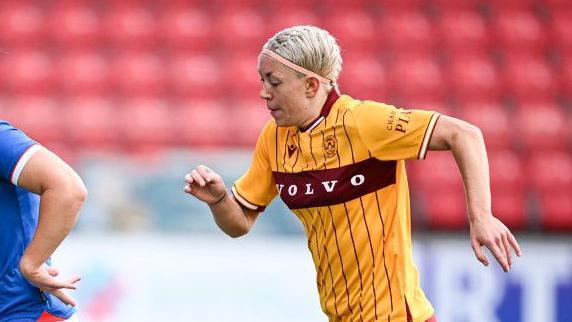 Bailley Collins chases