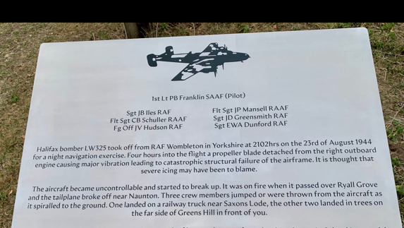 Writing on a plaque which gives the seven airmen's names: 1st Lt Franklin SAAF (pilot), Sgt JB Iles RAF, Flt Sgt CB Schuller RAAF; Fg Off JV Hudson RAF; Flt Sgt JP Mansell RAAF, Sgt JD Greensmith RAF and Sgt EWA Dunford RAF. It also has a picture of an aircraft and the story of how the Halifax bomber crashed. 