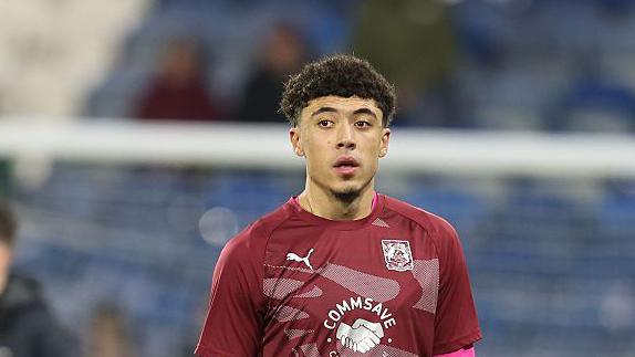Ethan Wheatley walks from pitch before a match against Huddersfield 
