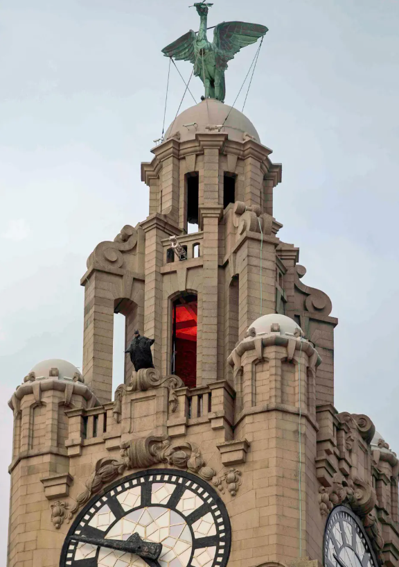 Batman on top of the Liver Building in Liverpool