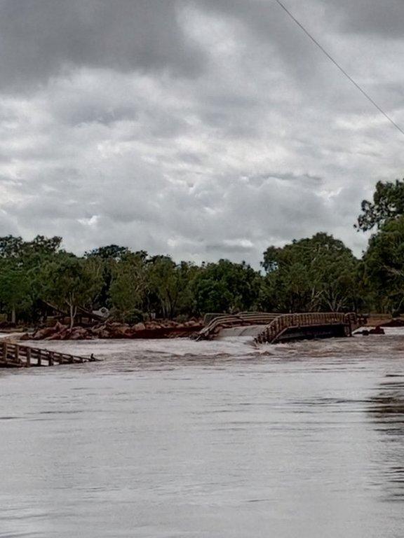 Bridge that's partially collapsed because of flood waters