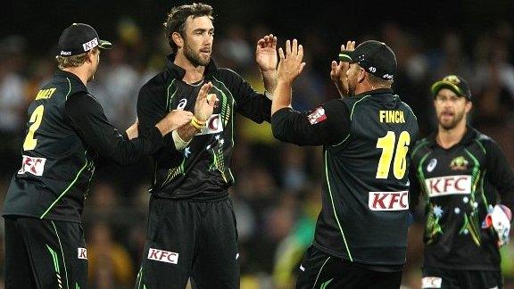 Glenn Maxwell celebrates the wicket of England batsman Eoin Morgan in Hobart