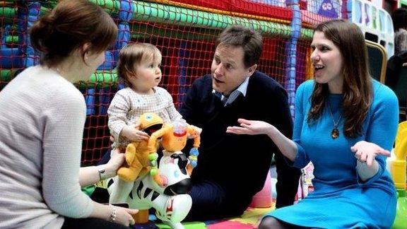 Liberal Democrats leader Nick Clegg alongside Jo Swinson at Playtown in Bishopbriggs, East Dunbartonshire