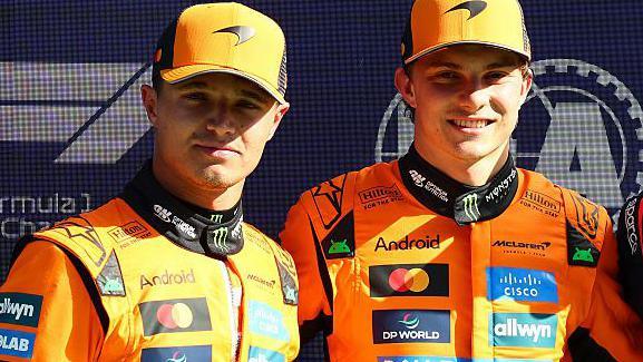 Lando Norris and Oscar Piastri stood alongside each other while posing for pictures after qualifying for the Dutch Grand Prix