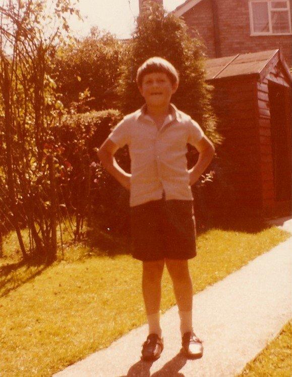 Robert as a child in shorts