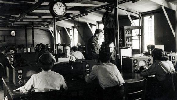 Workers in the communication room during World War Two