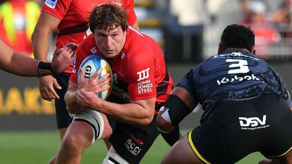 Cullen Grace carries the ball into a tackle