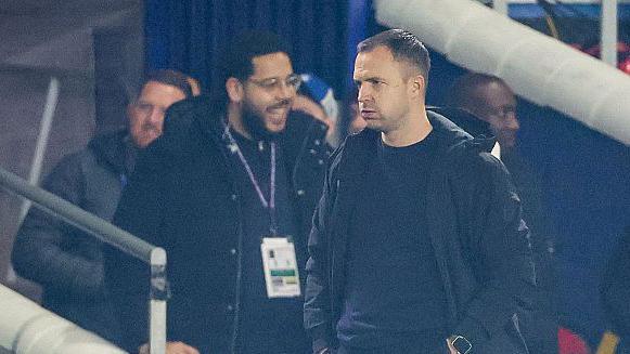 Birmingham City head coach Chris Davies stood on the touch line.