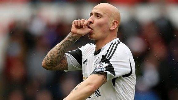 Jonjo Shelvey is congratulated by his Swansea team-mates