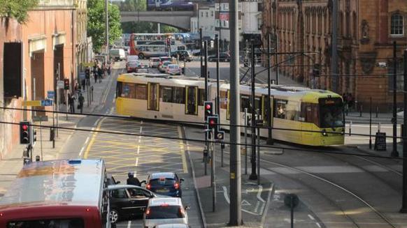 tram crosses London Road 