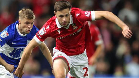 Wrexham wing-back Ryan Barnett in action during the 3-1 defeat against Birmingham City in League One 