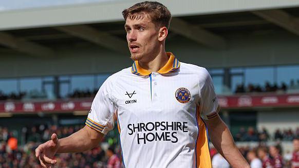 Shrewsbury Town striker George Lloyd in action