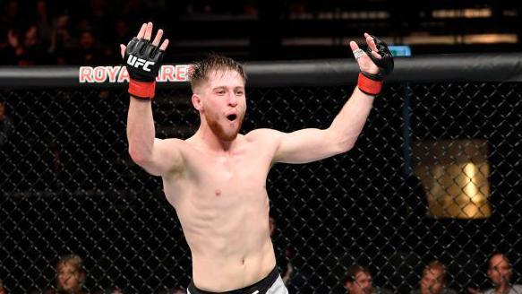 Jack Shore celebrates his UFC debut win over Nohelin Hernandez