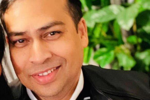 Raish Ahmed, a man with dark hair smiling at the camera