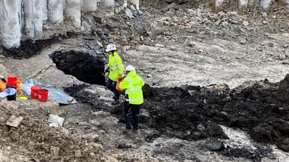 Scientist search the medieval latrine