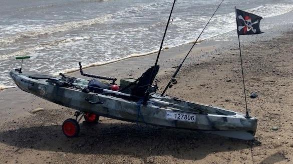 Antony Meli's kayak on a beach