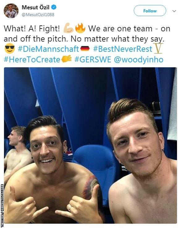 A tweet from Germany midfielder Mesut Ozil reading "What a fight. We are one team, on and off the pitch. No matter what they say."