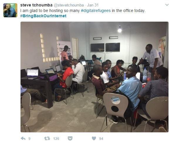 Tweet showing digital workers in an office