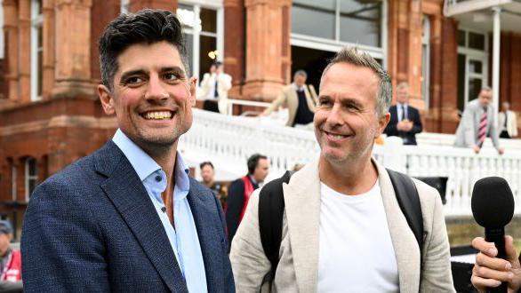 Smiling Sir Alastair Cook and Michael Vaughan stood infront of the pavilion at Lord's being interviewed for radio