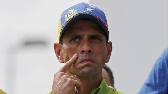 Opposition leader Henrique Capriles pauses during his speech at a protest rally against Venezuela's President Nicolas Maduro in Caracas on 23 November, 2013