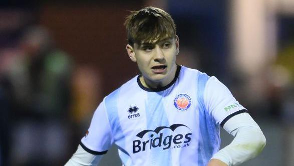 Josh Stokes of Aldershot Town during the Emirates FA Cup Second Round Replay match between Stockport County and Aldershot Town at Edgeley Park on December 13, 2023 in Stockport, England