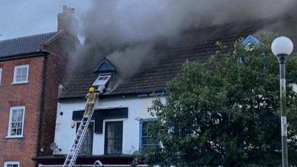 Firefighter on a ladder