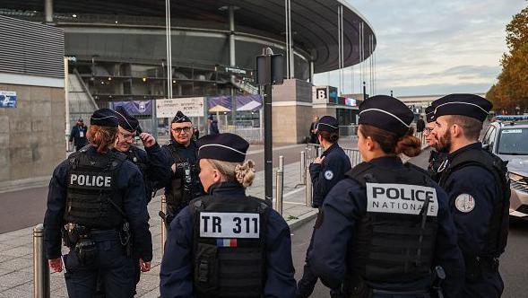 French police officers patrol prior to the UEFA Nations League Group A2 football match between France and Israel outside the Stade de France stadium, in Saint-Denis, in the northern outskirts of Paris, on November 14, 2024. 