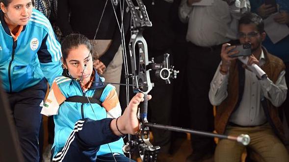 Para Asian gold medallist and world's first armless champion archer Sheetal Devi with coach Abhilasha Chaudhary during the launch of a book cover on December 1, 2023 in New Delhi