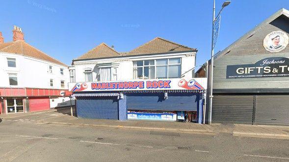 Google image of the exterior view of Mablethorpe Ice Cream Company  next to a Gifts & Toys shop