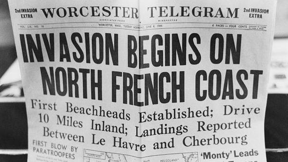 newspaper reads 'invasion begins on north french coast'