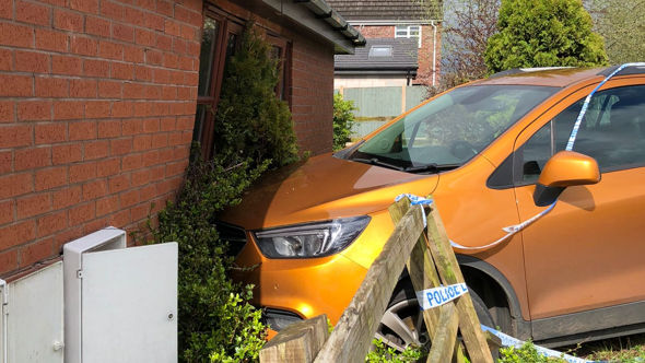 Close up of car in side of house