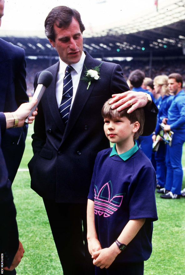 Tottenham keeper Ray Clemence with his son Stephen on the pitch at Wembley before the 1987 FA Cup final with Coventry