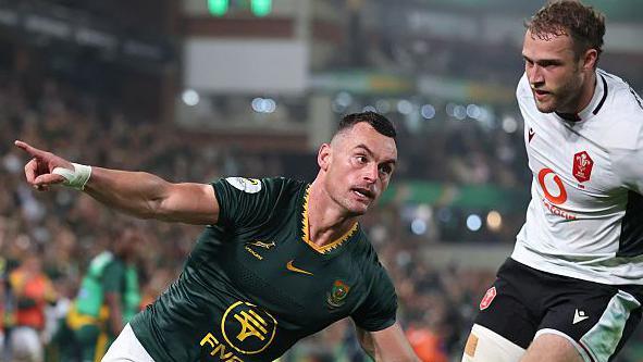 Jesse Kriel of South Africa celebrates scoring his team's third try against Wales