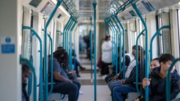 A computer generated image of customers riding in the new train carriages. 