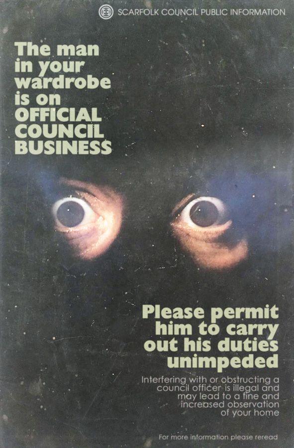 Scarfolk image featuring a pair of eyes hiding in darkness and this text: "The man in your wardrobe is on official council business. Please permit him to carry out his duties unimpeded."