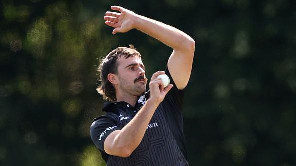 Ben Green in his delivery stride, getting primed to bowl during an appearance for Somerset