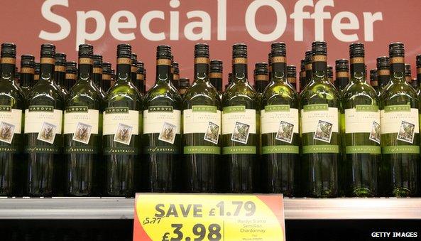 bottles on supermarket shelf