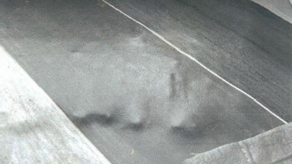 Close up of bumpy grey vinyl flooring