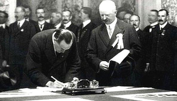 Edward Carson signs the Ulster Covenant,