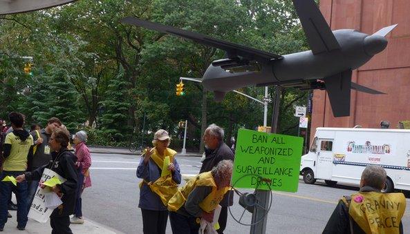 Protestors and drone