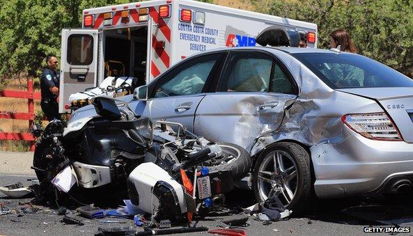 Car crash in front of ambulance